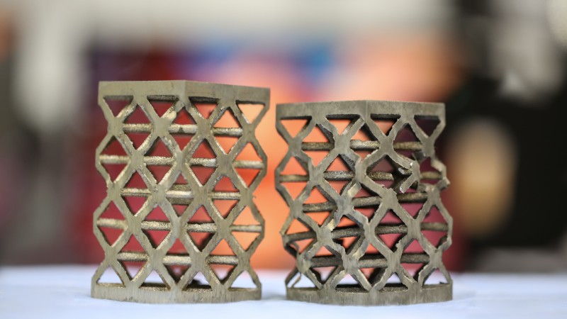 Energy absorbing cast aluminum lattice samples, before deformation (left) and after deformation (right), were examined at HFIR’s polychromatic cold neutron beamline (CG-1D) for structural quality and behavior under loads. (Image credit: ORNL/Genevieve Martin)